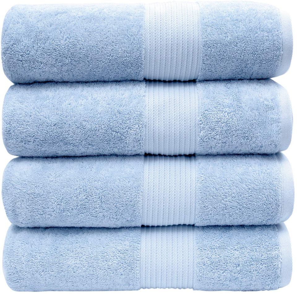 Bumble Towels sky blue oversized towel folded for lounging; highly absorbent.
