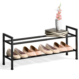 Bumusty two-tier expandable shoe rack in closet for flexible storage and tidy footwear.
