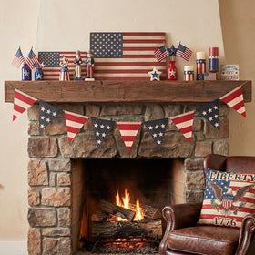 Bunny Chorus pennant garland draped over fireplace for holiday charm