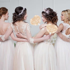 Burbell wedding fans doubling as wall decor to enhance ambience