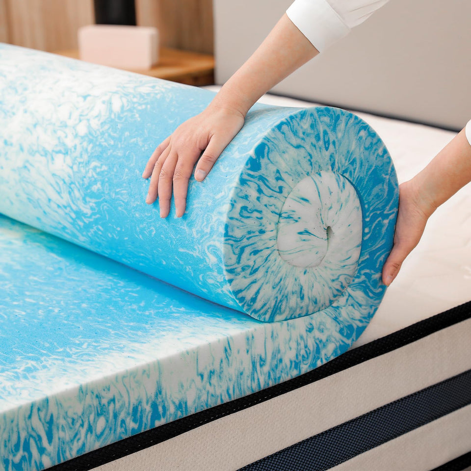 Bynex 2-inch gel memory foam topper unrolled on a twin bed for cooling comfort.