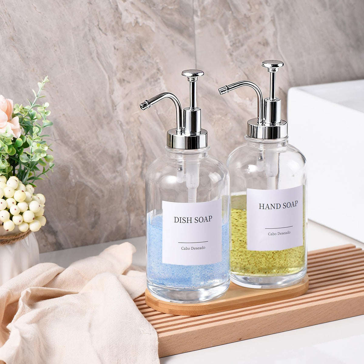 Cabo Deseado two-pack glass dispensers keep hand and dish soap organized.