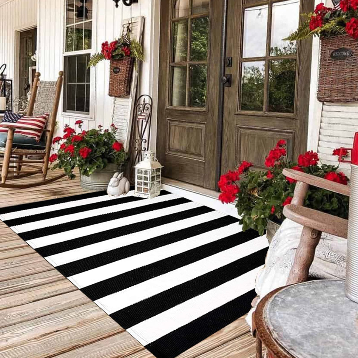 CAINANEL black and white striped front-door mat with durable daily-use protection.