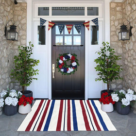 CAINANEL patriotic door mat with blue-white-red stripes welcomes guests at Independence Day.