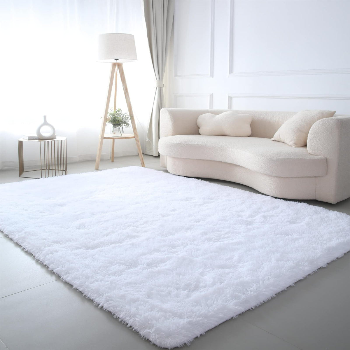 CAIYUECS Ultra Soft Shag Rug in white enhances living room warmth and comfort.