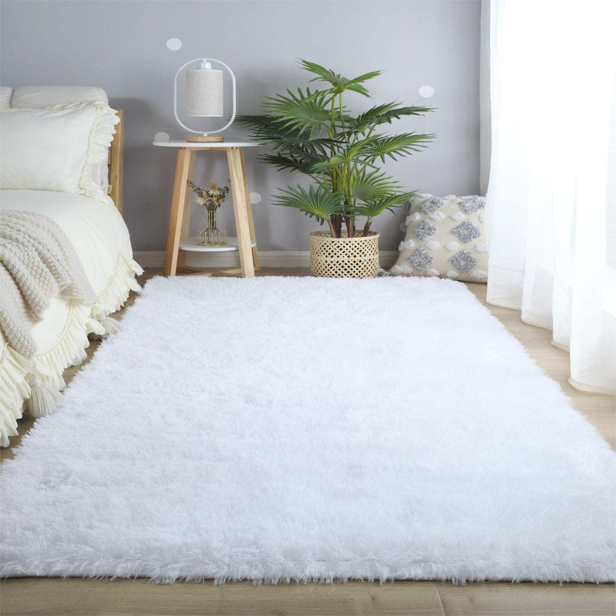 CAIYUECS rug features non-slip backing to stay in place on floors.