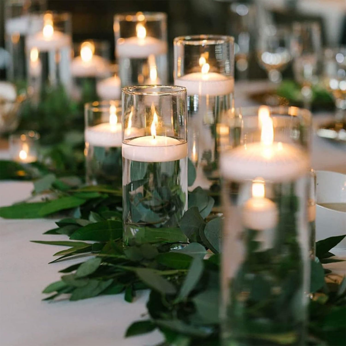 CAKETYCG white floating candle on romantic table for a warm, long-lasting glow.
