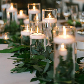 CAKETYCG white floating candle on romantic table for a warm, long-lasting glow.