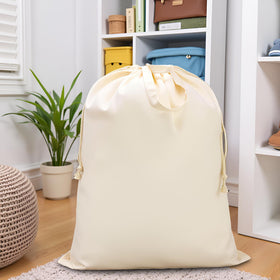 Two-pack CALACH beige laundry bags offer practical storage liners