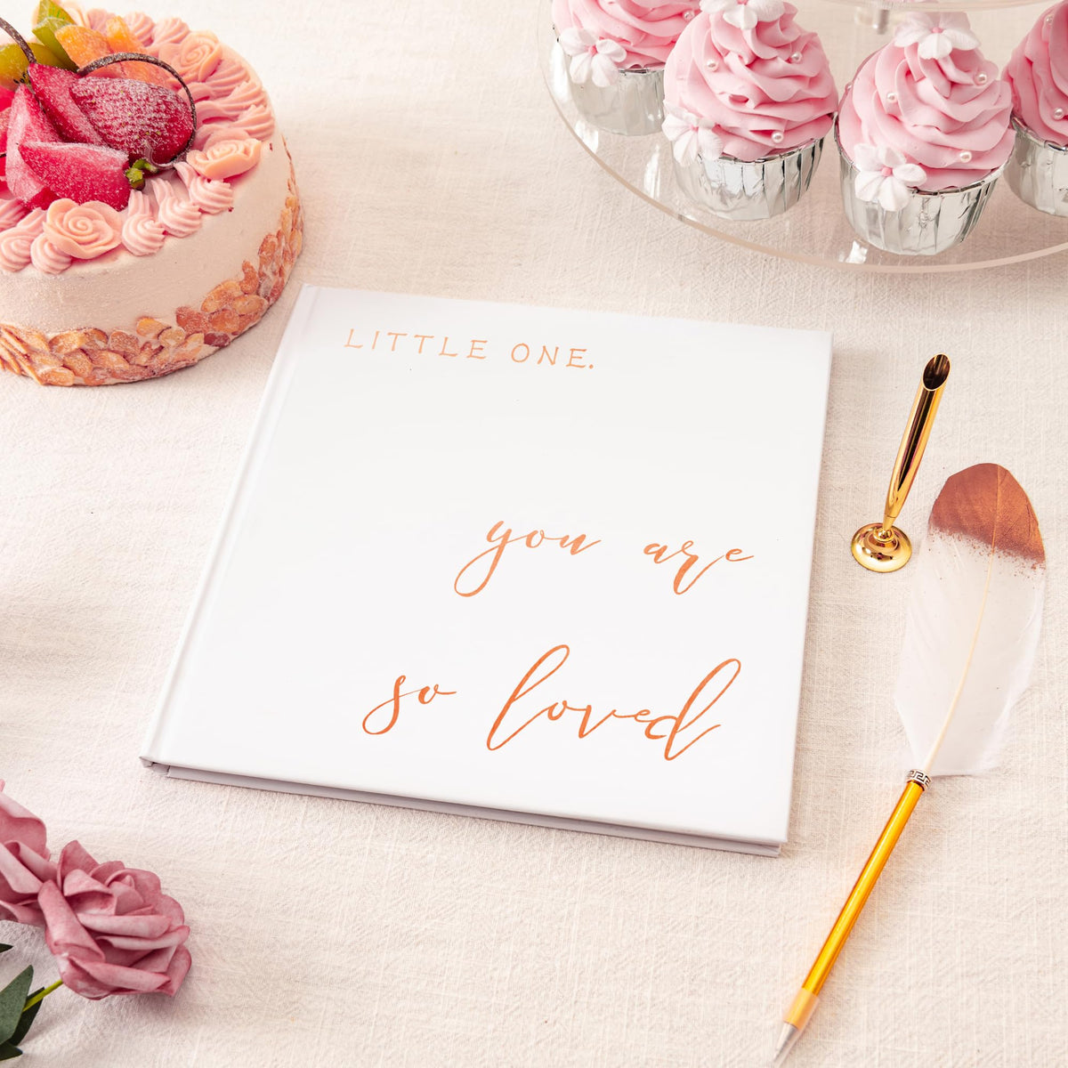 Calculs rose gold foil cover complements any baby shower theme.