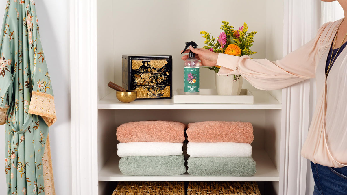 Caldrea Orange Blossom Bamboo on linen revives fabrics in bedrooms and cars