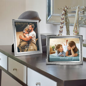 Calenzana four-pack 8x10 frames on desk showcase versatile table or shelf arrangements.