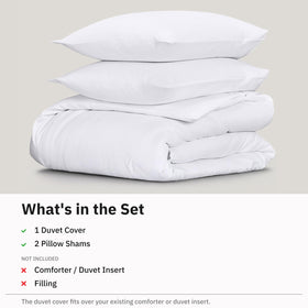 California Design Den queen-size duvet cover shown on bed for a snug fit.