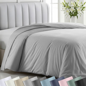 California Design Den full/queen duvet cover in light grey on bed, soft cotton sateen.