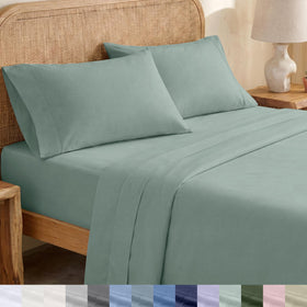 California Design Den king percale sheets in sage green offer crisp, breathable comfort.