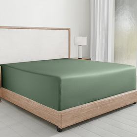 California Design Den queen fitted sheet pine-green fabric close-up shows soft, smooth texture for comfort.