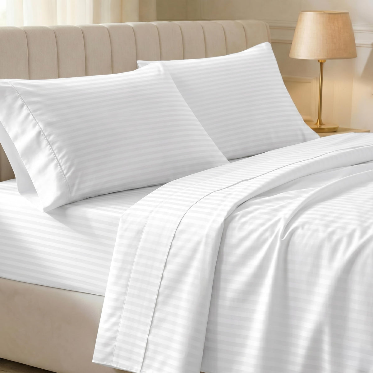 California Design Den striped white sateen king sheet close-up showing silky feel for year-round comfort.