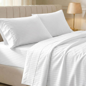 California Design Den striped white sateen king sheet close-up showing silky feel for year-round comfort.