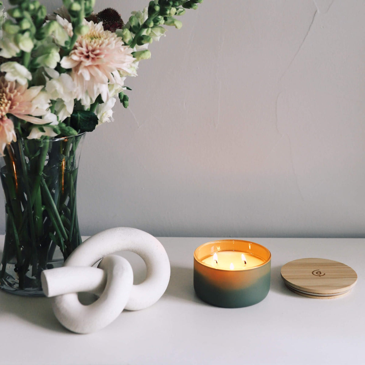 Calyan Wax Co. candle in a living room setup enhances cozy evenings.