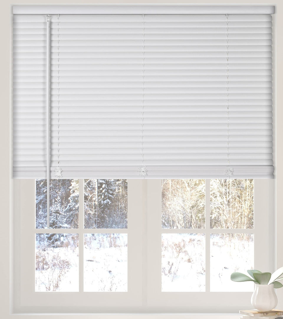 Calyx Interiors cordless white 1in mini blinds offer child-safe light control in any room.