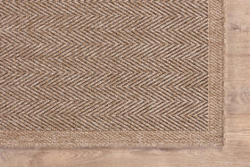 CAMILSON Easy Jute Rug has a low 0.3-inch pile for easy chair clearance.