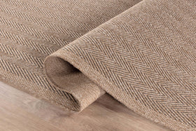 CAMILSON Easy Jute Rug with seagrass-look weave adds coastal charm.