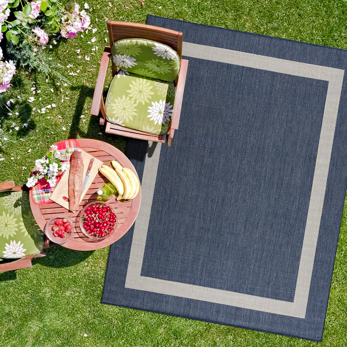 CAMILSON rug used in indoor-outdoor usage examples for kitchen and porch.
