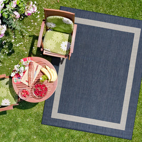 CAMILSON rug used in indoor-outdoor usage examples for kitchen and porch.