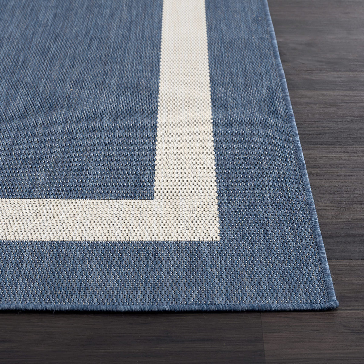 Lightweight CAMILSON rug easy to move between indoor and outdoor spaces.