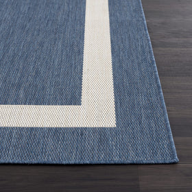 Lightweight CAMILSON rug easy to move between indoor and outdoor spaces.
