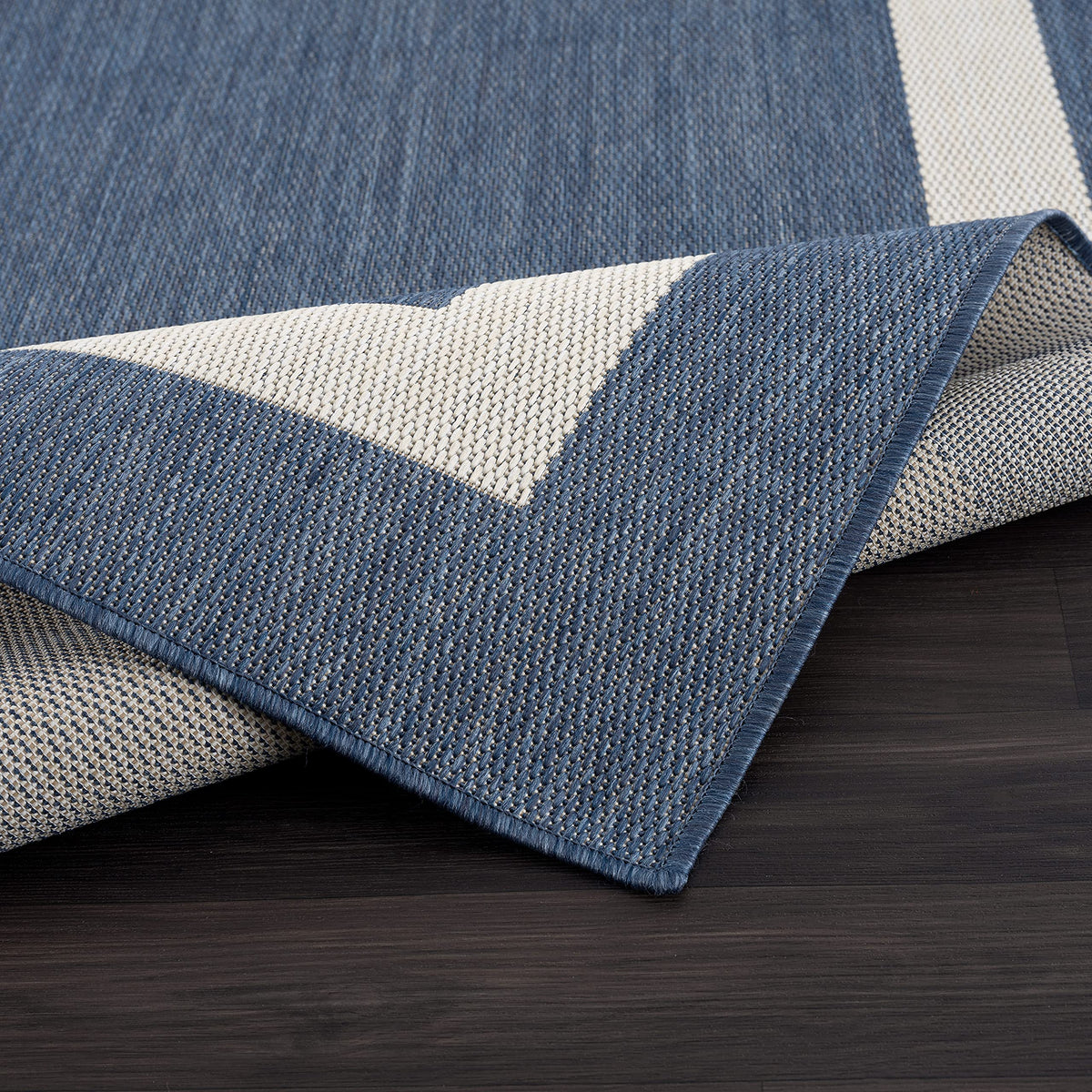 CAMILSON rug in a patio living area setup for a cozy outdoor lounge.