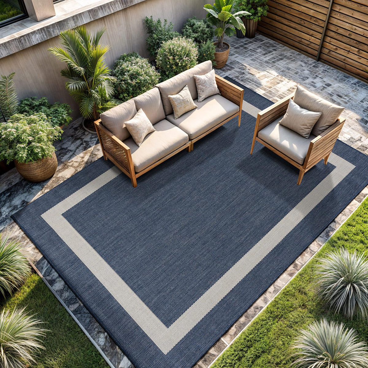CAMILSON rug demonstrating water and dust resistance on a deck.