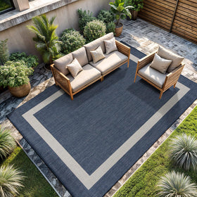 CAMILSON rug demonstrating water and dust resistance on a deck.