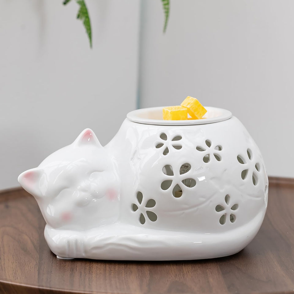 Candeldo cat wax melt warmer front view with warm glow for cozy spaces