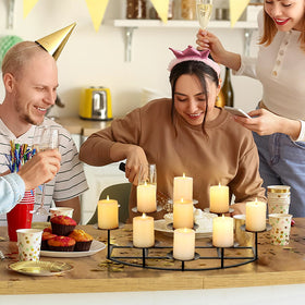 Candeldo nine-height black candle holder creates varied height arrangements for visual interest.