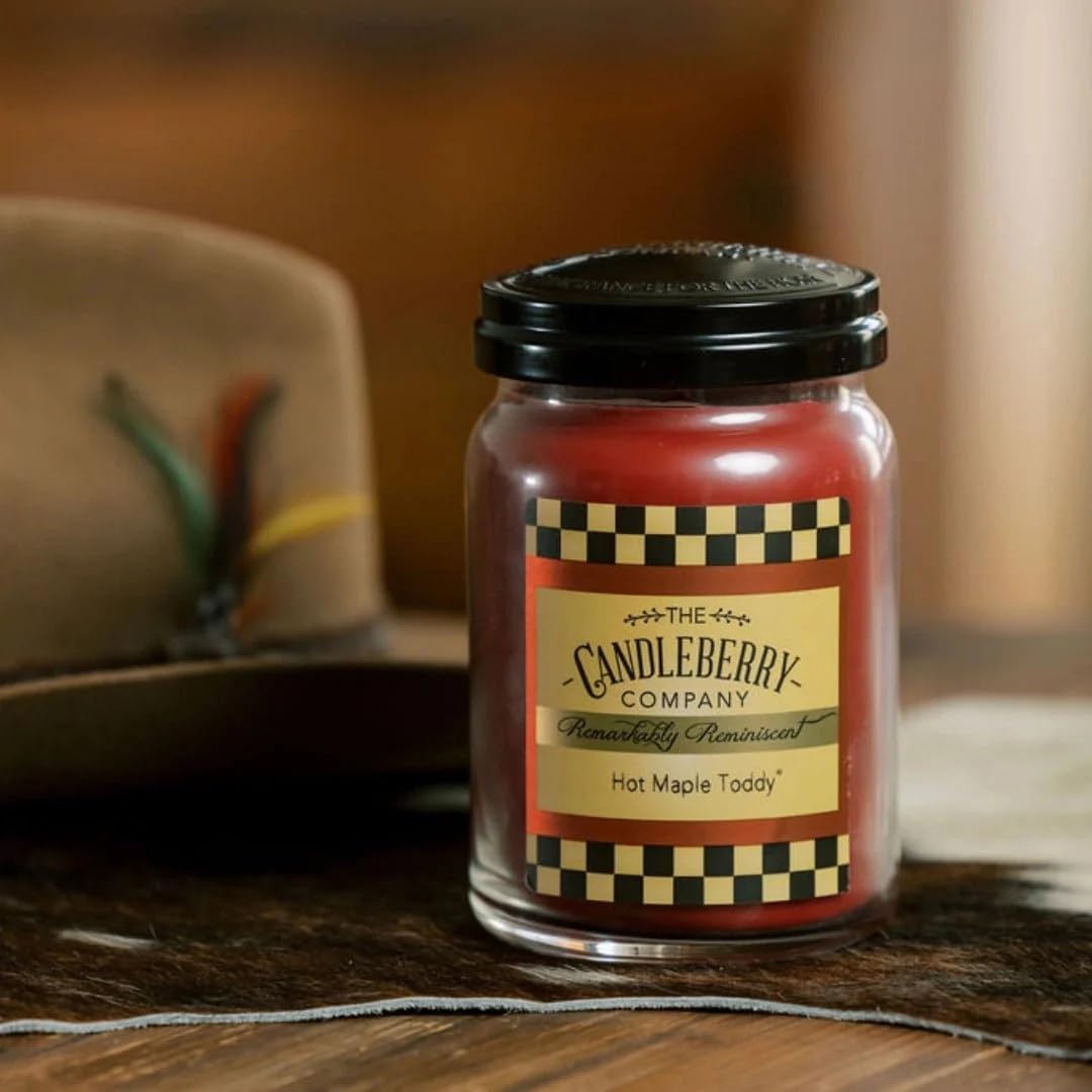 Candleberry Hot Maple Toddy jar lit glow creates a relaxing atmosphere.