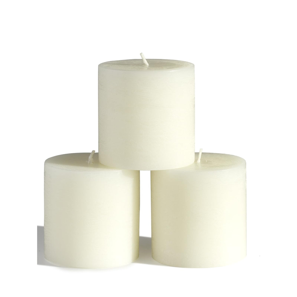 CandWAX ivory 3x3 pillar candle set arranged for a centerpiece
