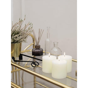 CandWAX ivory pillar candle on dining table for ambiance