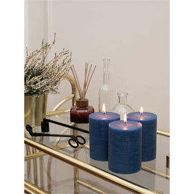 CANDWAX 4-inch navy candles create cozy outdoor table ambiance