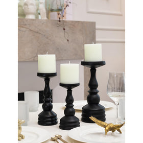Wedding centerpiece featuring CandWAX ivory pillar candles