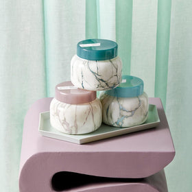 Elegant Capri Blue jar repurposed for stylish home storage after use.