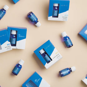Capri Blue diffuser oil in workspace for a fresh, inviting mood