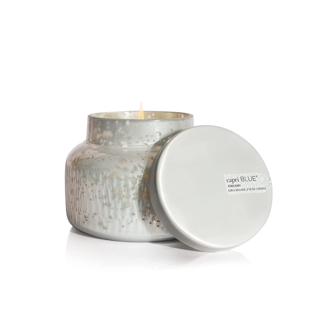 Capri Blue Holiday Mercury Jar candle in Volcano scent adds festive ambiance to living spaces