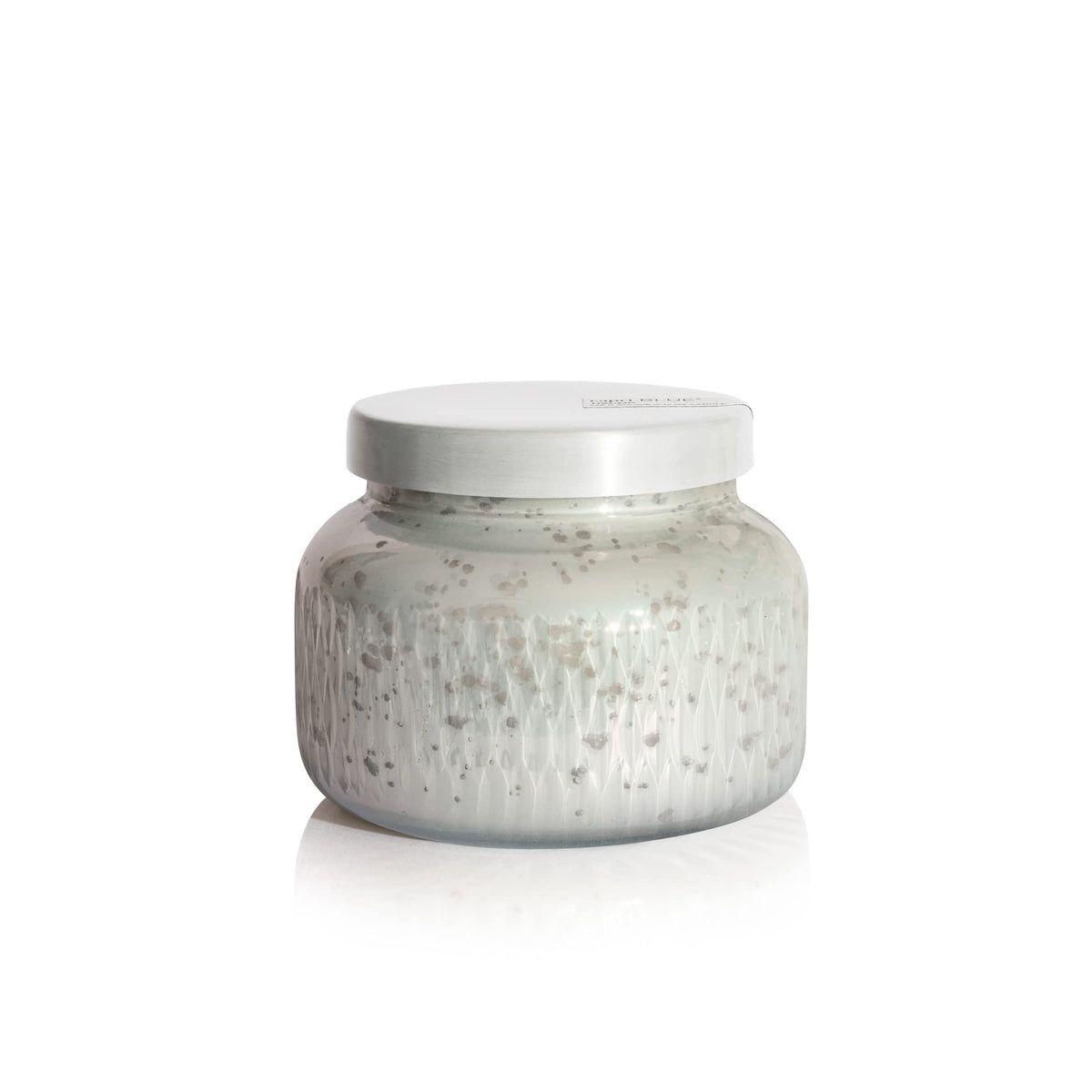 Capri Blue Holiday Mercury Jar with white-gold lid elevates holiday table decor
