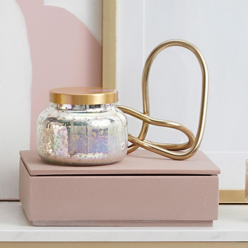 Capri Blue Signature iridescent jar showcased as a luxe centerpiece option.