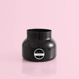 Capri Blue Volcano black jar candle side view for stylish ambience in any room.