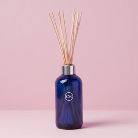 Capri Blue Volcano reed sticks release steady fragrance for cozy rooms.