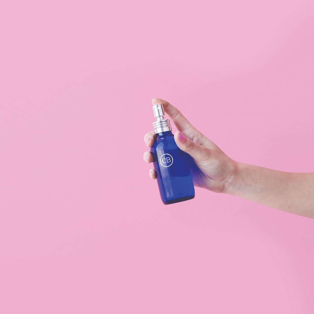 Capri Blue Volcano room spray label close-up emphasizing long-lasting fragrance