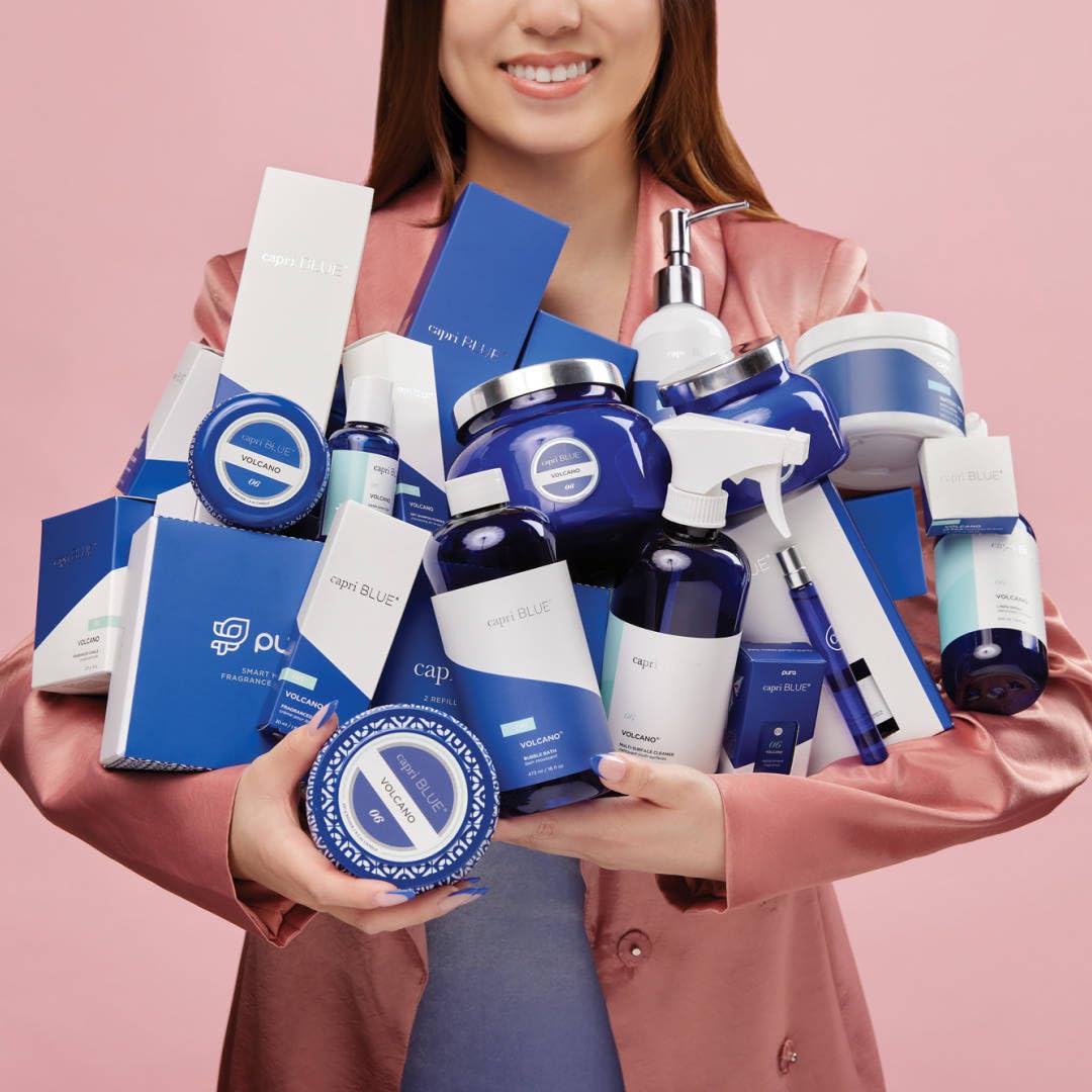 Capri Blue Volcano room spray in a cozy living room setup for daily freshness