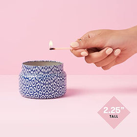 Capri Blue Volcano travel tin jar design highlights the white and blue packaging.